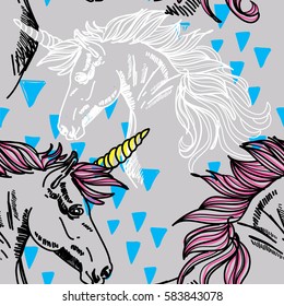 Seamless pattern with unicorns. Spots watercolor paint. Bright multi-colored background.