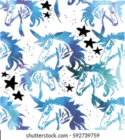 Seamless pattern with unicorns. Spots watercolor paint. Bright multi-colored background.