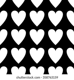 Seamless pattern Valentine's Day with a big white hearts on a black background.