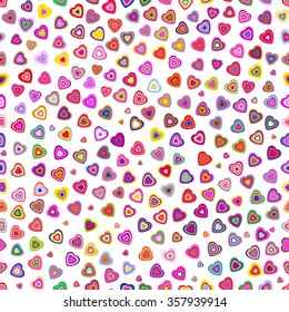 Seamless pattern for Valentines day, with colorful hearts.  Motley girly background with colorful hearts isolated on white. Trendy, fun wrapping, wallpaper, greeting, decoration,  ornament.