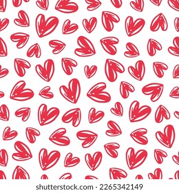 Seamless pattern for Valentine's Day with red hand drawn hearts.