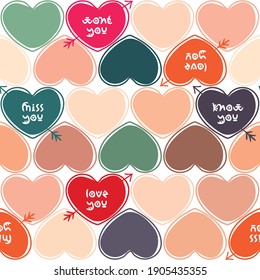 seamless pattern for valentine's day, repeating multicolored hearts with text on the background, congratulations for lovers, for printing on paper and fabric