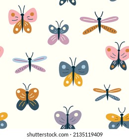 Seamless pattern with a variety of colorful butterflies and dragonflies in random order