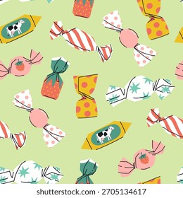 Seamless pattern with various candies on a green background. Vector graphics.