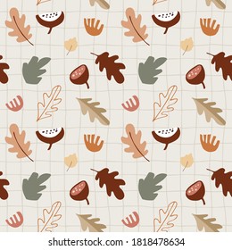 Seamless pattern with various colorful fall leaves, fruit and flowers. Thanksgiving or Halloweeen concept. Autumn design for textile, fabric and scrapbooking. Vector checkered illustration background.