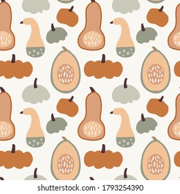 Seamless pattern with various colorful whole and cut pumpkins. Thanksgiving or Halloweeen concept. Autumn vegetable tile design for textile, fabric and scrapbooking. Vector illustration background.