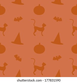 A seamless pattern of various repeated Halloween themed animal and object silhouettes.