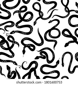 Seamless pattern with various snakes or serpents on light background. Botanical background on tropical theme. Black and white snake. Boho flat design for fabric, textile, wrapping paper and wallpaper.