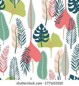Seamless pattern with of various tropical leaves in bright colours.