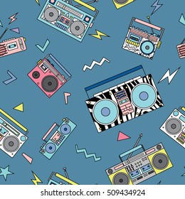 Seamless pattern with various vintage cassette players. Retro 80s and 90s style vector art. 