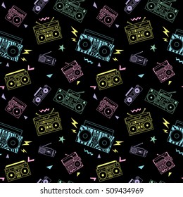 Seamless pattern with various vintage cassette players. Retro 80s and 90s style vector art. 