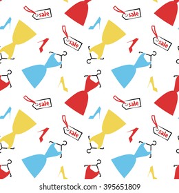 Seamless pattern with various  women's dresses and shoes of bright colors on the white background