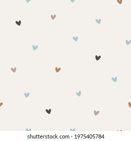 Seamless pattern. Vector abstract background. Small colorful hearts on milk background. 