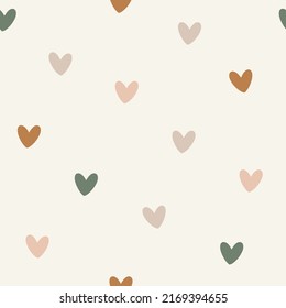 Seamless pattern. Vector abstract background. Small colorful hearts on milk background. 