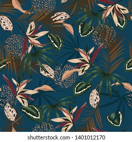 Seamless pattern vector Dark Tropical jungle and colorful palm leaves, exotic palnts with animal skin  floral  design for fashion,fabric,web,wallpaper,and all prints on dark blue