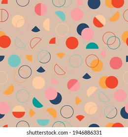 Seamless pattern vector design with a set of geometric circles with vivid colors and a minimalist and retro style