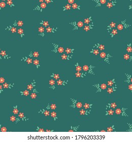 Seamless pattern vector design of small orange flowers with leaf on green background. The cute template for fashion prints, wallpaper, textile, and wrapping paper.