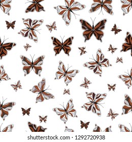 Seamless pattern. Vector illustration. Beautiful color butterflies on a brown, white and gray colors. Background for fabric, textile, print and invitation.