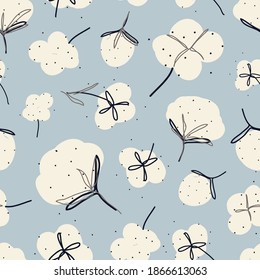 Seamless pattern vector illustration with fluffy organic cotton flower on light blue background. Perfect for kids apparel, fabric, textile, nursery room decoration, wrapping paper and print design.