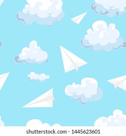 Seamless pattern with vector paper airplane and clouds