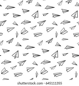 Seamless pattern with vector paper airplane. Travel, route symbol. Vector illustration of  background with hand drawn plane. Outline. Hand drawn doodle airplane.  