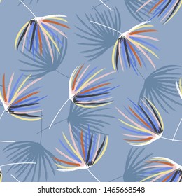 Seamless pattern in vector Retro pastel mood colorful hand brush sketch of palm leaves .Design feor fashion, fabric, web,wallpaper, wrappidng and all prints on vintage blue background