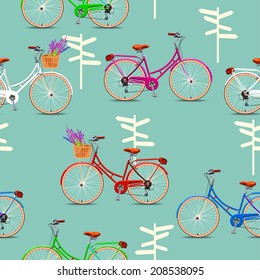 Seamless pattern with vintage bicycles on green background. Vector illustration.