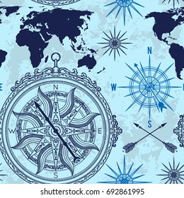 Seamless pattern with vintage compass, world map and wind rose. Retro hand drawn vector illustration on grunge background