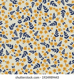 the seamless pattern is vintage . pale beige background. small yellow flowers and dark blue leaves. trendy print for textiles and wallpaper.