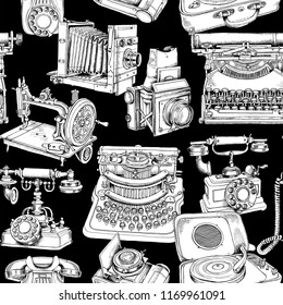 Seamless pattern with a Vintage Sewing machine, Camera, Typewriter, Telephone. Textile, t-shirt composition, hand drawn style print. Vector black and white illustration.