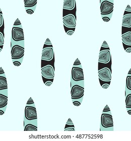 Seamless pattern with vintage surfboards background.
