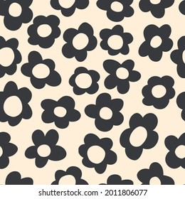 seamless pattern with vintage vector groovy flowers. modern elements. stylized black flowers silhouettes on a light beige background. surface design, textile, stationery, wrapping paper and covers