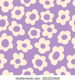 seamless pattern with vintage vector groovy flowers. modern elements. stylized flowers silhouettes on a lavender color  background. surface design, textile, stationery, wrapping paper and covers