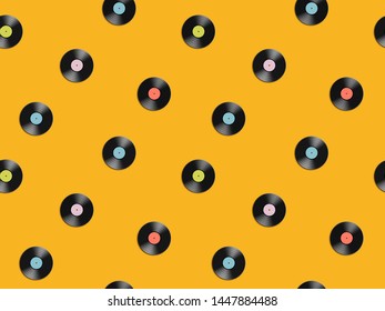 Seamless pattern with vinyl discs. Retro background. Vector illustration.