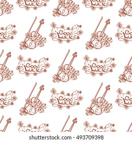 Seamless pattern with violin and banner good luck.