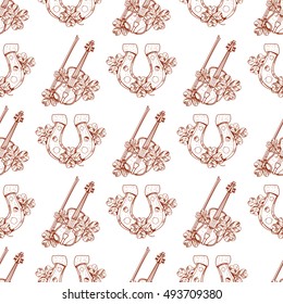 Seamless pattern with a violin and a horseshoe.Seamless pattern with a violin and a horseshoe.