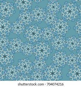 Seamless pattern. Wallpaper of snowflakes. Blue-green, white.