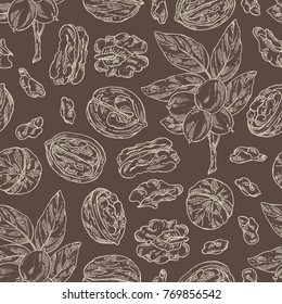 Seamless pattern with walnut: nuts and brahch with walnut. Vector hand drawn illustration.