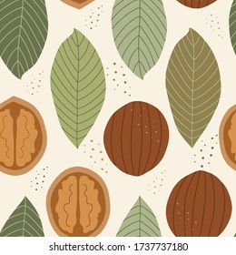Seamless pattern with walnuts and leaves. Healthy diet. Modern background for packaging, ads, labels and other designs. Hand drawn illustration.