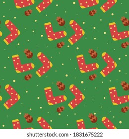 Seamless pattern warm cozy socks. Pine cones, falling snow. Christmas pattern, winter packaging. Green background. Vector illustration in flat style