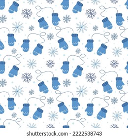 Seamless pattern with warm winter mittens and snowflakes on a white background. Christmas print. Colorful vector illustration hand drawn. Packaging or fabric, card or cover, paper
