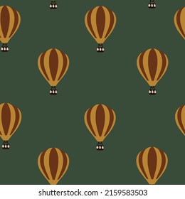Seamless pattern with water balloons on a green background