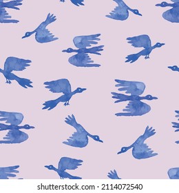 Seamless pattern of waterolor drawings of abstract blue flying birds
