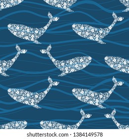 Seamless pattern with waves and silhouette of whale with floral ornament. Vector illustration
