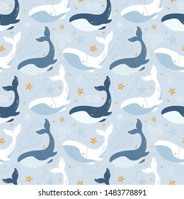 Seamless pattern with whales. Marine theme. Vector cute blue background. Blue whales, golden starfish. Suitable for fabric, wallpaper, clothing.