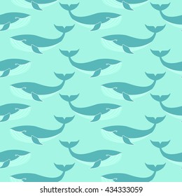 Seamless pattern with whales on turquoise background.