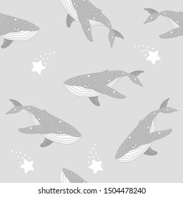 Seamless pattern with whales and stars. Vector background for children.