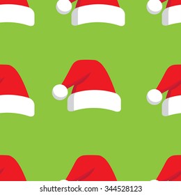 seamless pattern which repeats Christmas hat on a green background
