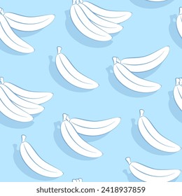 Seamless pattern of white bananas on a blue background