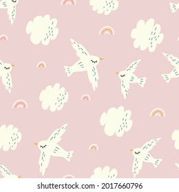 Seamless pattern with white birds and clouds on a pink background. Cartoon pattern of birds flying in the sky.